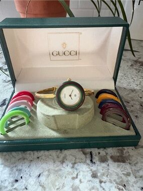 Gucci Gold Bangle Watch with Interchangeable Color Bezels